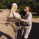Illustration for article titled Watch a pelican flying from a camera on his beak